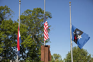 Flags flying at memorial.